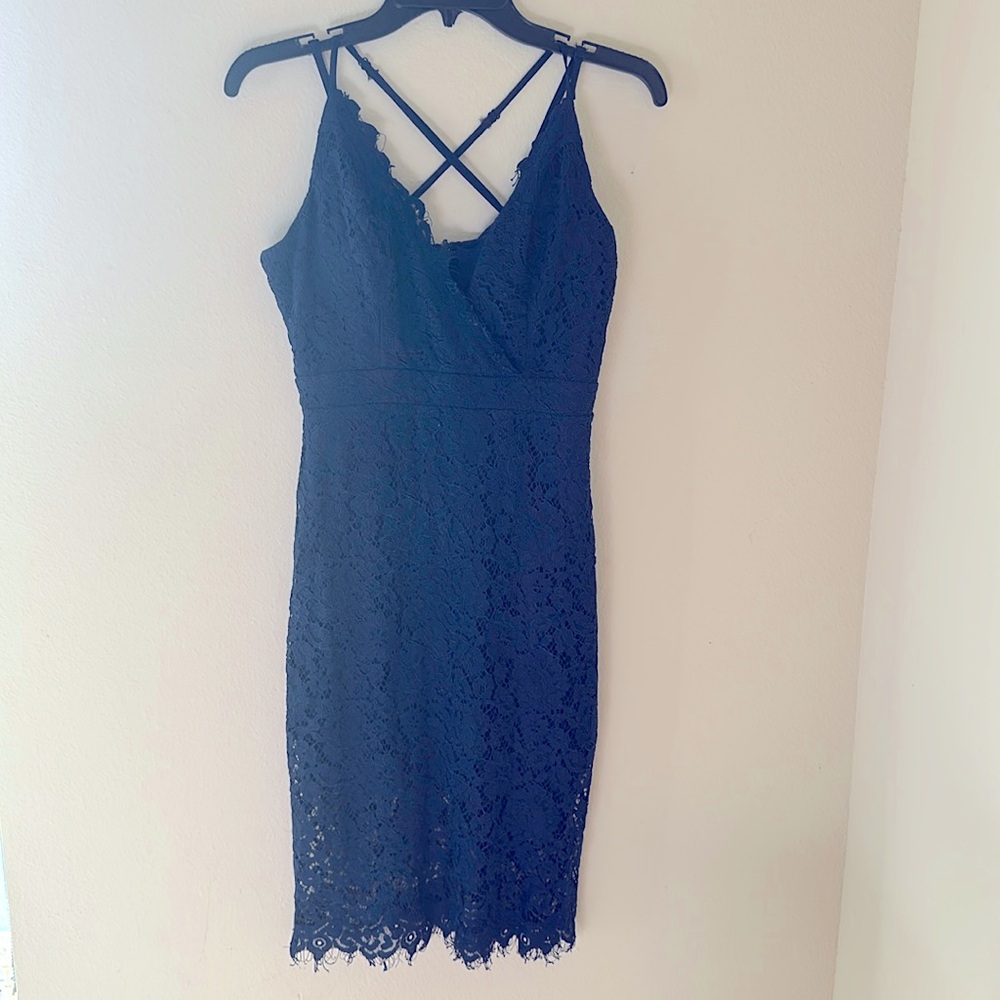 Blue lace flowers tight mini dress. SIZE M. Padded brought inside open back.